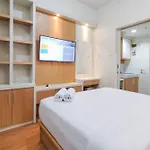 Minimalist And Homey Studio At Amartha View Apartment By Travelio